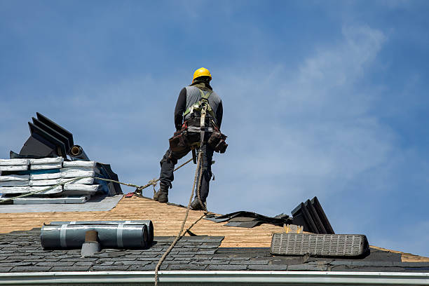 Professional Roof Replacement technician working in Le Grand, CA